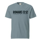 A slate blue short-sleeve t-shirt with 'ROMANS 13:12' and 'ARMOR OF LIGHT' printed in black across the chest, displayed on a clean white background.