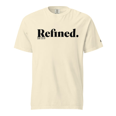 A cream-colored short-sleeve t-shirt with 'Refined.' printed in black serif font across the chest, accompanied by smaller text 'JOB 28:10' underneath, shown on a plain white background.