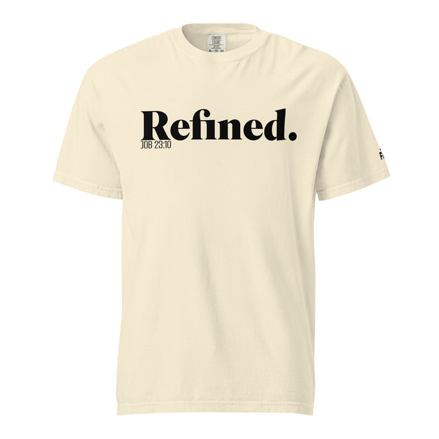 A cream-colored short-sleeve t-shirt with 'Refined.' printed in black serif font across the chest, accompanied by smaller text 'JOB 28:10' underneath, shown on a plain white background.