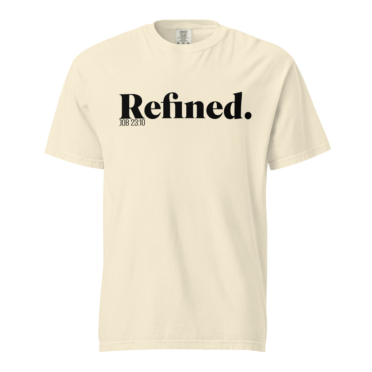 A cream-colored short-sleeve t-shirt with 'Refined.' printed in black serif font across the chest, accompanied by smaller text 'JOB 28:10' underneath, shown on a plain white background.