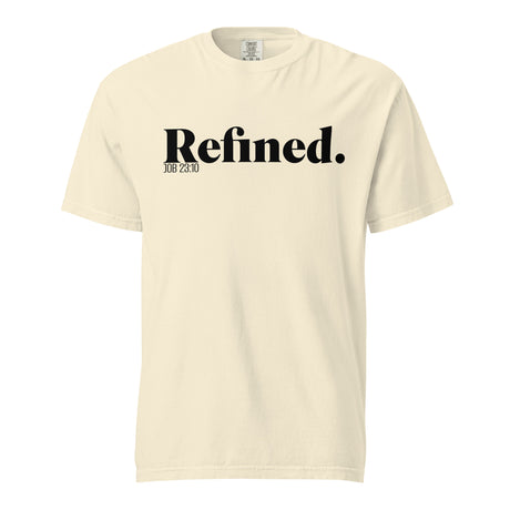 A cream-colored short-sleeve t-shirt with 'Refined.' printed in black serif font across the chest, accompanied by smaller text 'JOB 28:10' underneath, shown on a plain white background.