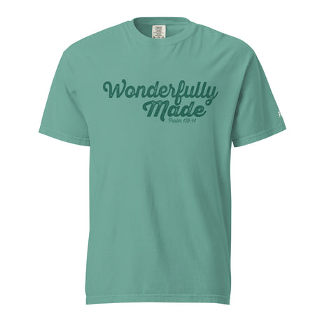 A mint green short-sleeve crewneck t-shirt with 'Wonderfully Made' printed in dark green script across the chest, displayed on a solid white background.