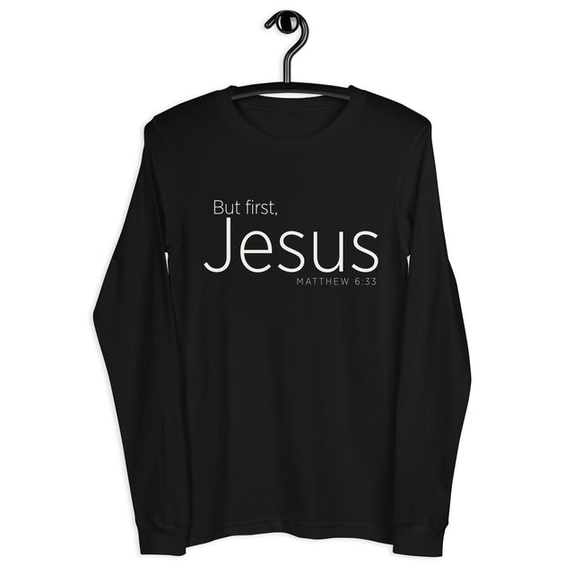 "But First, Jesus" "Matthew 6:33" printed in cream white ink on a black long sleeve shirt