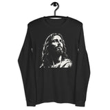 A black long-sleeve t-shirt hanging on a black hanger against a plain white background, featuring a high-contrast white graphic print of Jesus Christ's face on the chest.