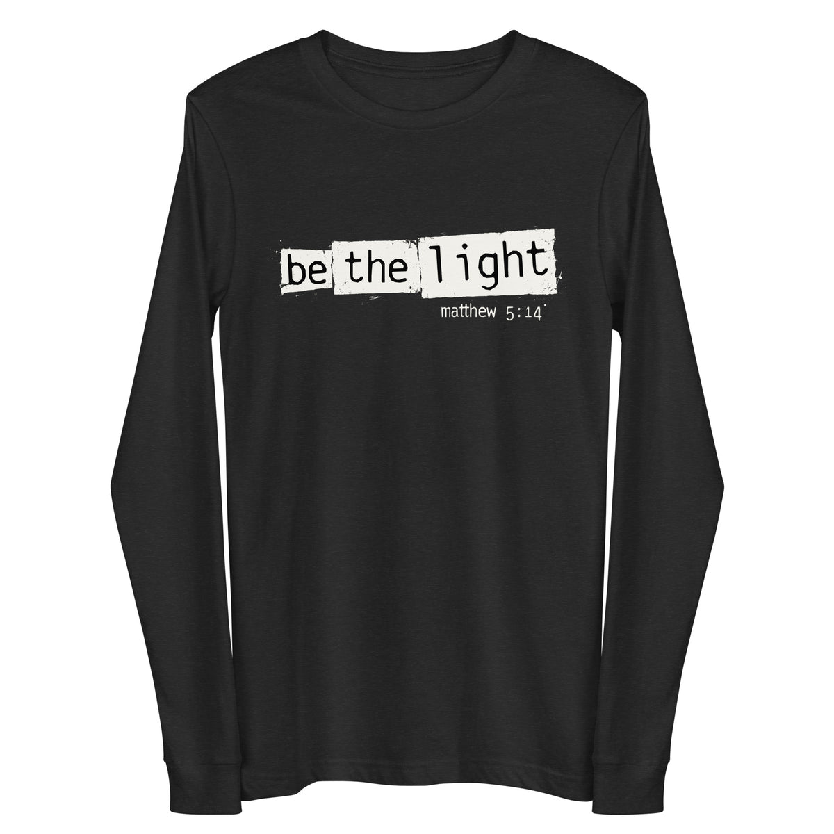 "Be The Light" "Matthew 5:14" in cream white designer grunge font on a black heather long sleeve shirt.