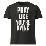 Black t-shirt with white text 'PRAY LIKE YOU'RE DYING' on a white background