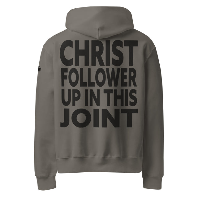 Gray hoodie with text 'CHRIST FOLLOWER UP IN THIS JOINT' on the back printed in black ink.
