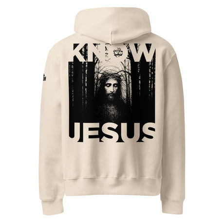 Beige hoodie with a graphic of Jesus in a forest and 'KNOW JESUS' text printed on the back of the hoodie in black ink.