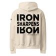Beige hoodie with 'IRON SHARPENS IRON Proverbs 27:17' text on the back against a white background