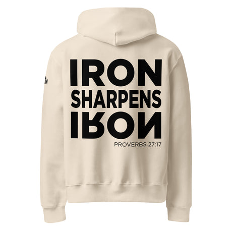 Beige hoodie with 'IRON SHARPENS IRON Proverbs 27:17' text on the back against a white background