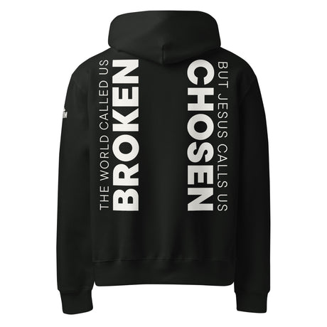 Black hoodie with white text printed on the back of the hoodie that says "The world called us broken, but Jesus calls us Chosen."