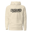 An off-white hooded sweatshirt with a black graphic print on the chest reading 'UNASHAMED' and 'ROMANS 1:16' below it, shown against a plain white background.
