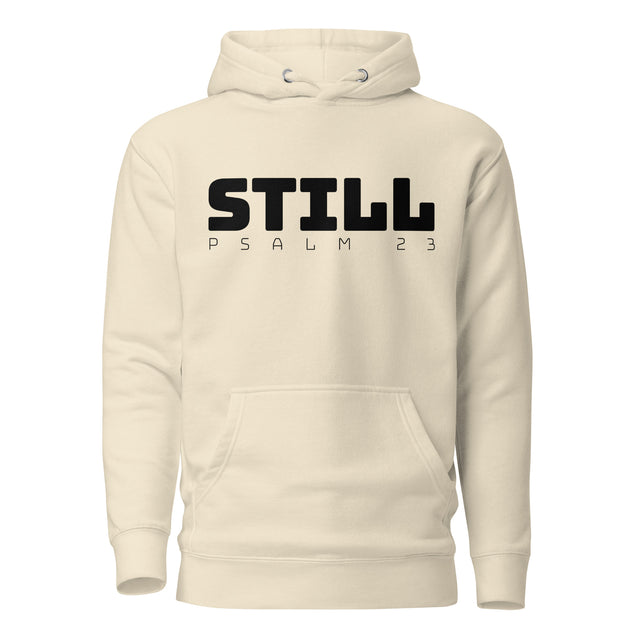 An off-white hooded sweatshirt with a black graphic print on the chest reading 'STILL PSALM 23', displayed against a solid white background.