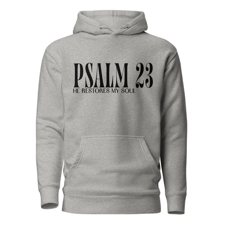 A light heather gray pullover hoodie with a black graphic print on the chest reading 'PSALM 23 HE RESTORES MY SOUL', shown against a plain white background.