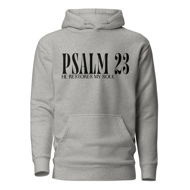 A light heather gray pullover hoodie with a black graphic print on the chest reading 'PSALM 23 HE RESTORES MY SOUL', shown against a plain white background.
