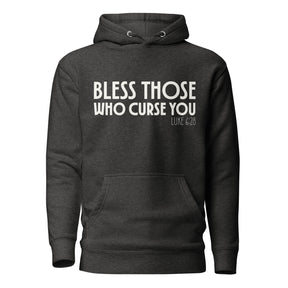 Dark gray hoodie with "Bless those who curse you" Luke 6:28 in white ink