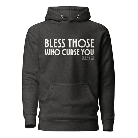 Dark gray hoodie with "Bless those who curse you" Luke 6:28 in white ink