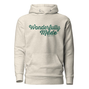 A light heather gray pullover hoodie with a front kangaroo pocket and drawstring hood, featuring the text 'Wonderfully Made' and 'Psalm 139:14' printed in teal on the chest.