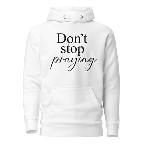 A white pullover hoodie with the text 'Don't stop praying' printed on the chest in black, shown against a plain white background.