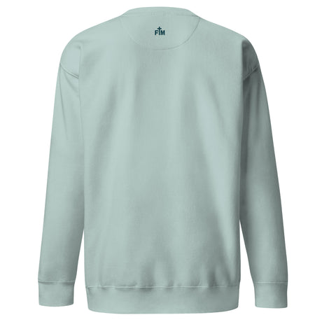 Small teal Faith Mode logo on the upper back of an agave long sleeve sweatshirt