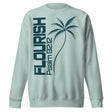 "Flourish Psalm 92:12" printed in dark teal ink on an agave colored sweatshirt