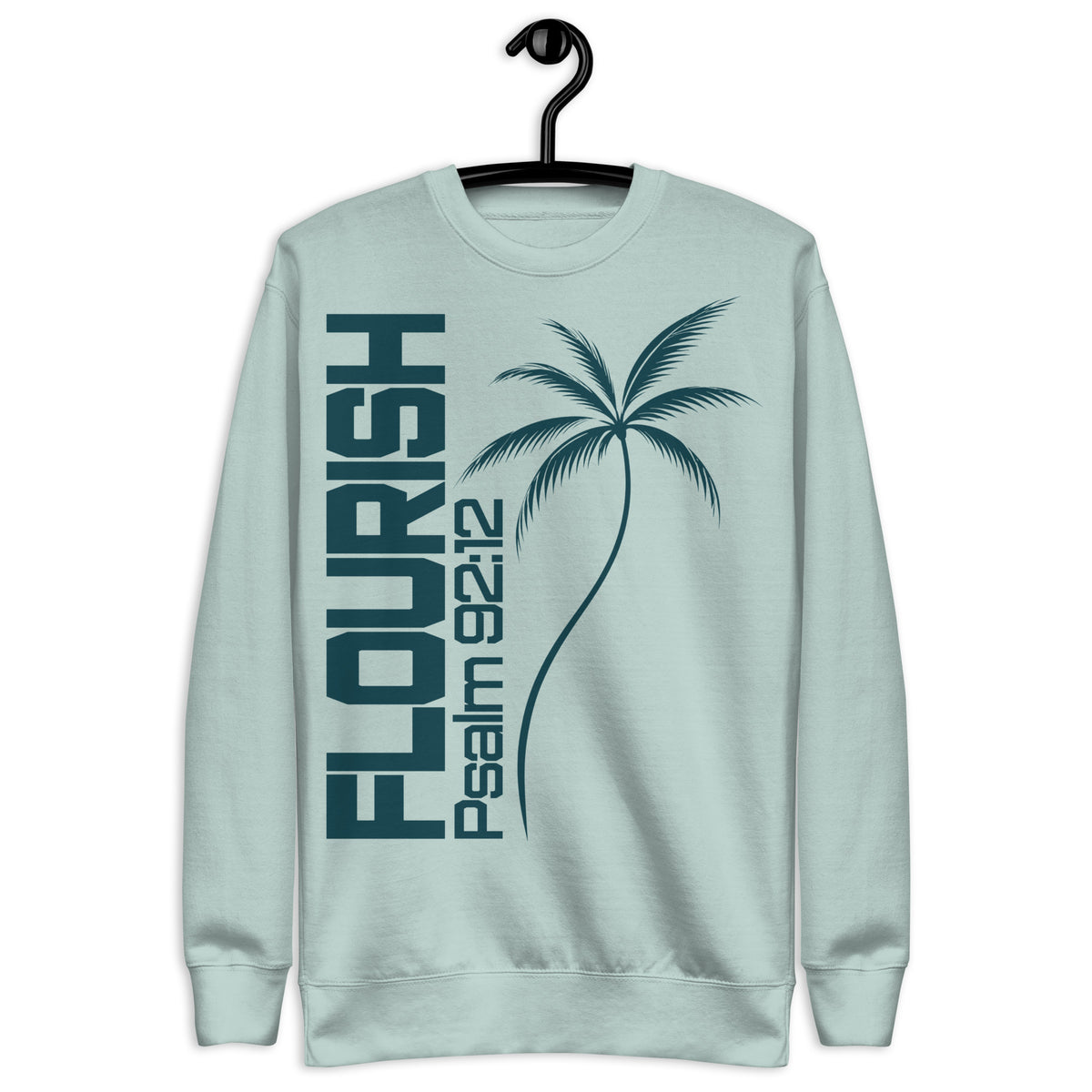 "Flourish Psalm 92:12" printed in dark teal ink on an agave colored sweatshirt, hanger view