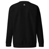 Small cream white Faith Mode logo shown on upper back of black sweatshirt