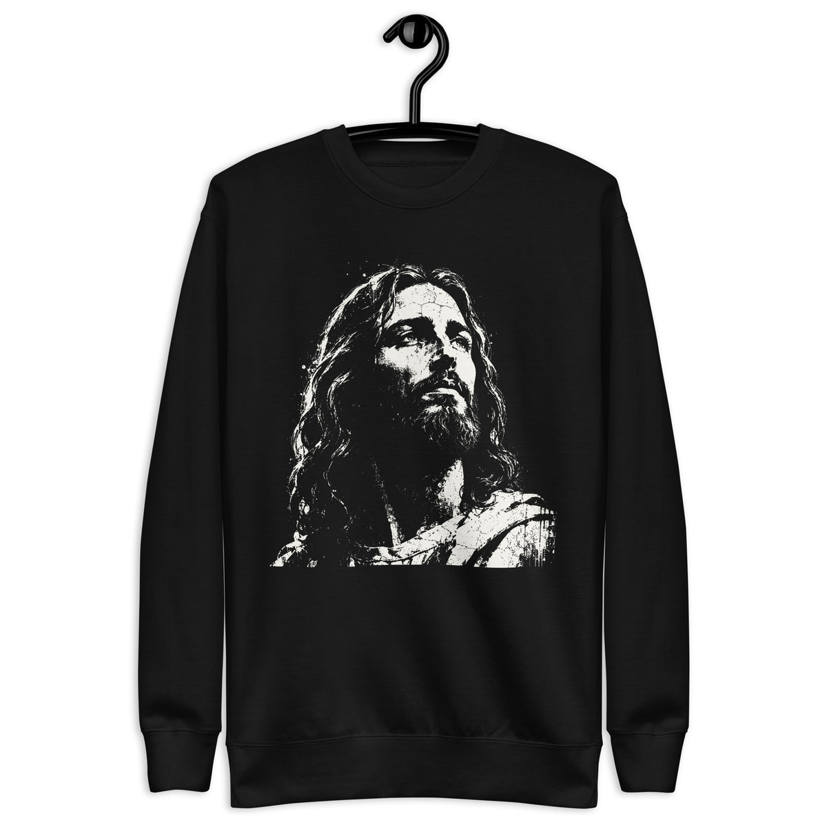 Black unisex sweatshirt featuring a large distressed cream-white artistic portrait of Jesus looking upward. Shown with hanger.