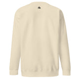 Small black Faith Mode logo printed on the upper back of a bone-colored sweatshirt