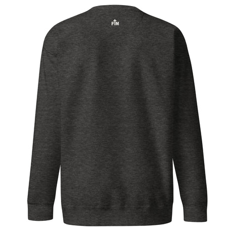 Small Faith Mode logo in cream white on a charcoal grey sweatshirt