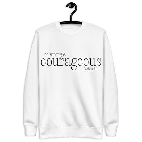 "be strong & courageous Joshua 1:9" written in an elegant designer black font on a white sweatshirt, hanger view