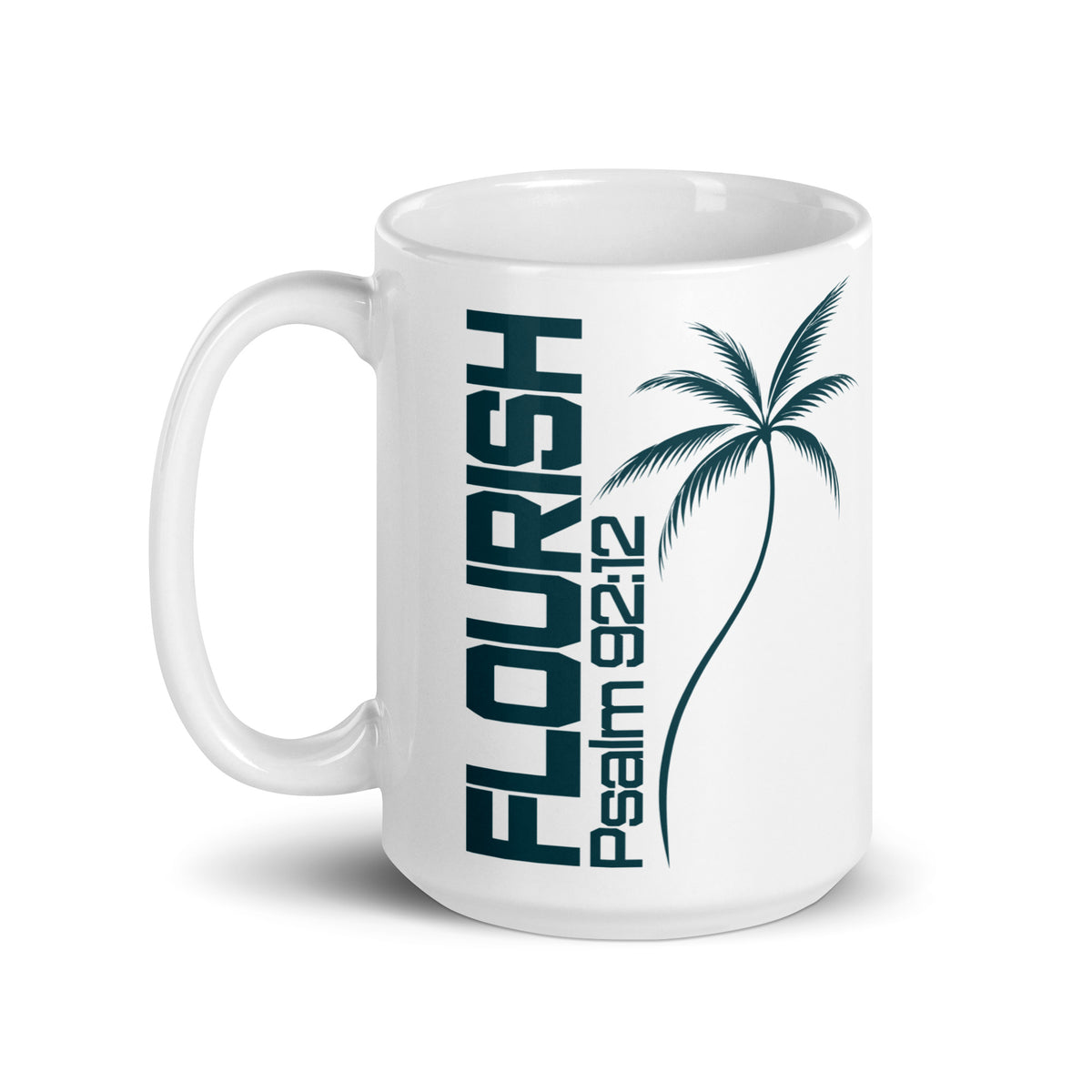 White glossy coffee mug with a left-side handle, featuring dark teal vertical FLOURISH lettering, Psalm 92:12, and a palm tree illustration.