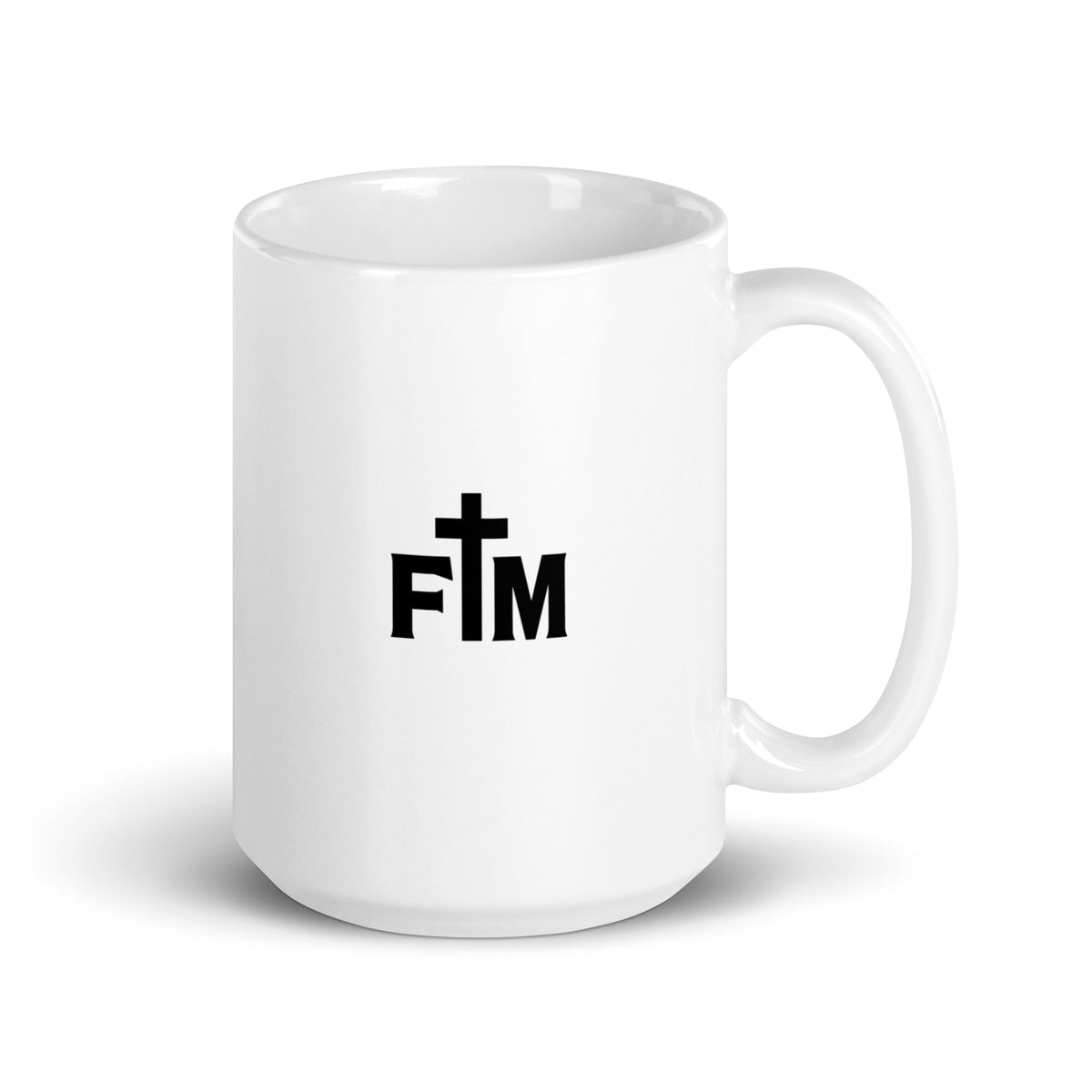Small black Faith Mode logo on the bag of a white ceramic mug