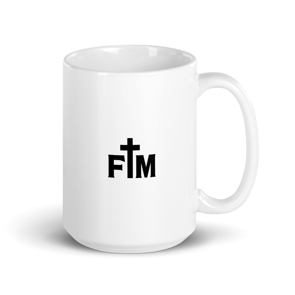 A Small Black Faith Mode Logo lies dead-center on the back of a white glossy ceramic coffee mug