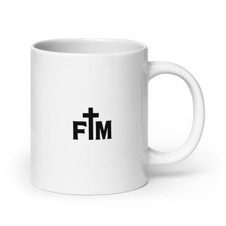 A Small Black Faith Mode Logo lies dead-center on the back of a white glossy ceramic coffee mug