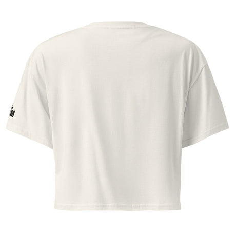 White t-shirt with a small black logo on the sleeve against a white background