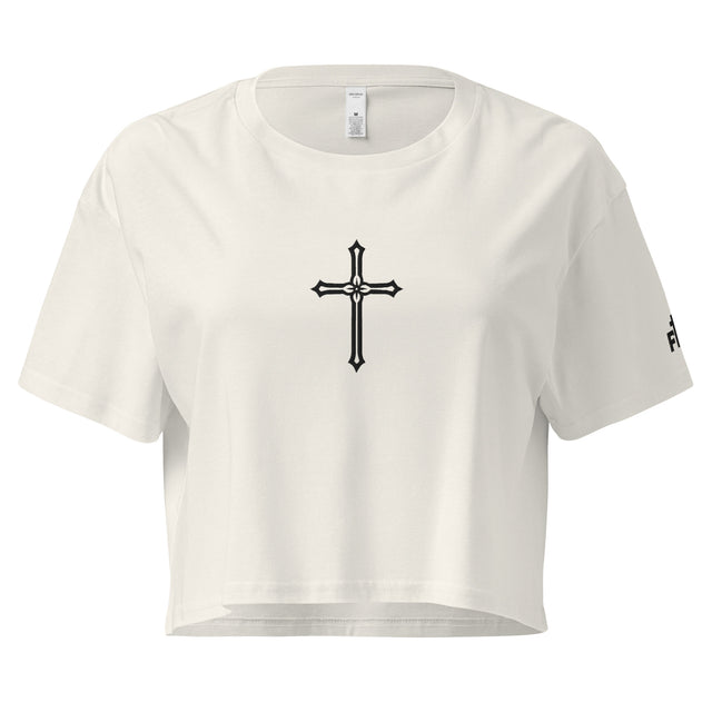 White crop top with a black cross design on a white background