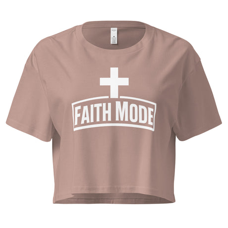 Mauve crop top with 'FAITH MODE' print on a white background