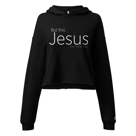 "But First Jesus, Matthew 6:33" in white lettering on a black crop hoodie