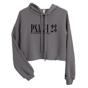 Front view of a Storm gray women’s crop hoodie with black “Psalm 23” lettering and “He Restores My Soul” beneath it, a drawstring hood, and long sleeves.