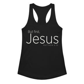 Black women’s racerback tank top featuring cream-white “But First, Jesus” typography and Matthew 6:33 on the front.
