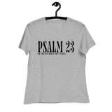 A light heather gray short-sleeve t-shirt hanging on a black hanger against a plain white background. The front of the shirt features the text 'PSALM 23' in a large black serif font, with 'HE RESTORES MY SOUL' printed underneath in a smaller black serif font.