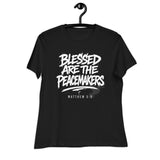 Black t-shirt with 'Blessed are the Peacemakers' text on a hanger