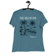 "The Sea is His" "Psalm 95:5" Printed in Cream white with a lightly distressed vintage 70s beach design in dark teal against a lighter teal women's shirt
