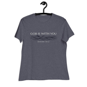 Cream white font that says "God Is With You" and under blue line designer style water accents "Isaiah 43:2" on a heather navy blue women's shirt