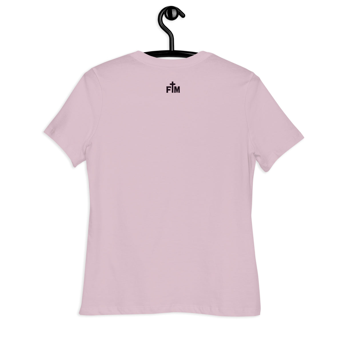 The "FM" Faith Mode logo printed in deep purple ink, small on the upper back neck area of a light violet shirt 