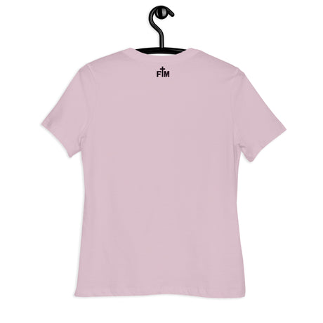 The "FM" Faith Mode logo printed in deep purple ink, small on the upper back neck area of a light violet shirt 
