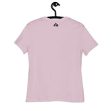 A light violet short-sleeve t-shirt hanging on a black hanger against a plain white background. The back of the shirt features a small Faith Mode "FM" print in dark plum text near the upper collar.