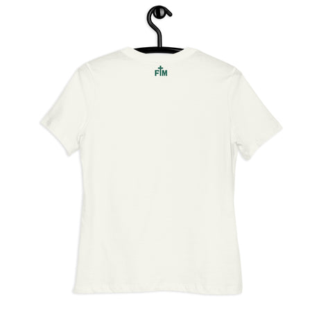 An off-white short-sleeve t-shirt hanging on a black hanger against a plain white background, featuring a small green 'FM' logo printed on the upper back.